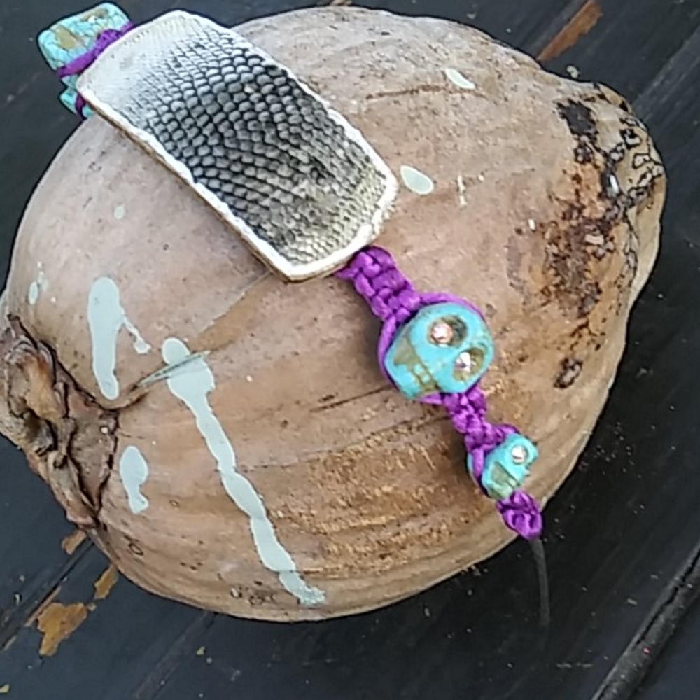 Iguana skin bracelet with turquoise skulls